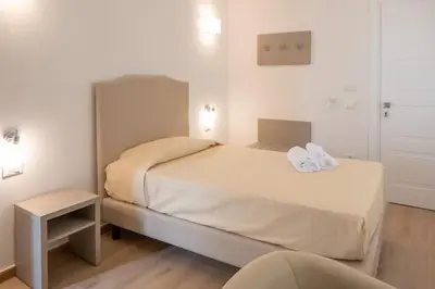 Letto o letti in una camera di NONNU NONNA