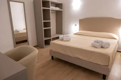 Letto o letti in una camera di NONNU NONNA