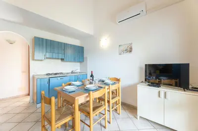 Cucina o angolo cottura di Simple Gem of Le Dimore di Budoni 2 Bedroom Trilo6 Apartment sleeps 6 persons