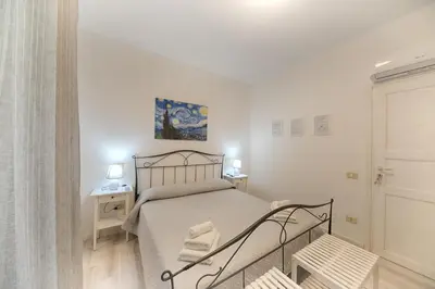 Letto o letti in una camera di Margherita Guest House