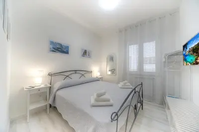 Letto o letti in una camera di Margherita Guest House