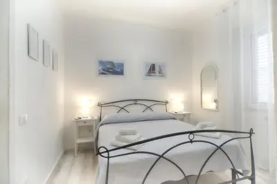 Letto o letti in una camera di Margherita Guest House