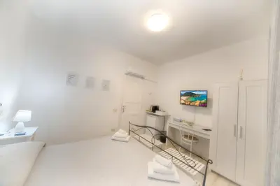 Letto o letti in una camera di Margherita Guest House