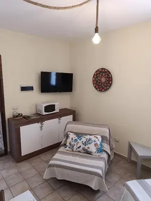 TV o dispositivi per l'intrattenimento presso Appartamento Mar di Sardegna