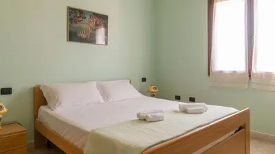 Letto o letti in una camera di Casa Su Lizu