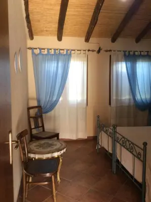 Letto o letti in una camera di Tenuta Don Ballore Country Resort