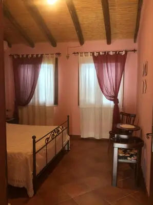 Letto o letti in una camera di Tenuta Don Ballore Country Resort