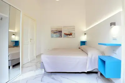Letto o letti in una camera di Depandance Caramare