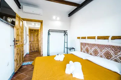 Letto o letti in una camera di CAMERA VISTA MARE CASA RAIMONDA Ammentos Posada