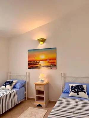 Letto o letti in una camera di VILLA FRANCESCA
