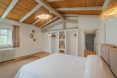 Letto o letti in una camera di Villa Aromata