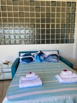 Letto o letti in una camera di Sardinia Art House