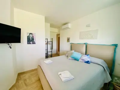 Letto o letti in una camera di Sardinia Art House