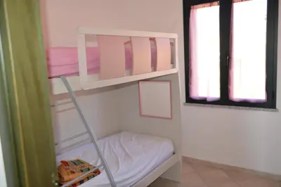 Letto o letti in una camera di Casa Viola