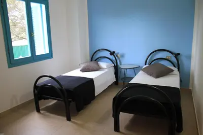 Letto o letti in una camera di Li Piri