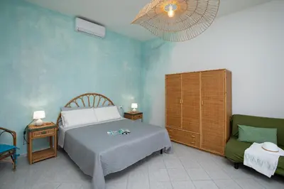 Letto o letti in una camera di Casa Bata by Wonderful Italy