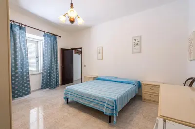 Letto o letti in una camera di Casa Vacanze Relaxia