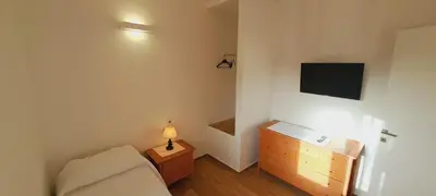 TV o dispositivi per l'intrattenimento presso San Teodoro Rooms