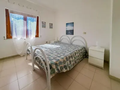 Letto o letti in una camera di Appartamento Bilocale Valentina's House San Teodoro