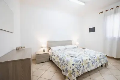 Letto o letti in una camera di Le Viole