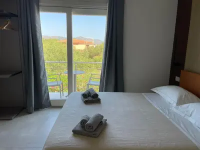 Letto o letti in una camera di Villa Est