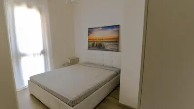Letto o letti in una camera di Nido dei Gabbiani