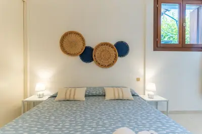 Letto o letti in una camera di Mammai's Home