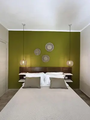 Letto o letti in una camera di Sunrise Sardinia Posada