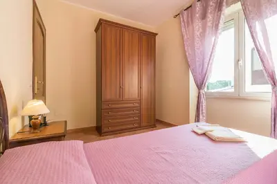 Letto o letti in una camera di Casa Giovanni