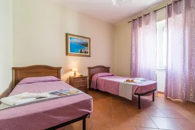 Letto o letti in una camera di Casa Giovanni