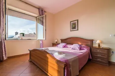 Letto o letti in una camera di Casa Giovanni