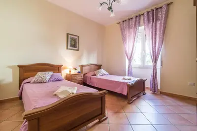 Letto o letti in una camera di Casa Giovanni