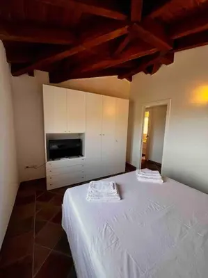 Letto o letti in una camera di Prestige San Teodoro Straula