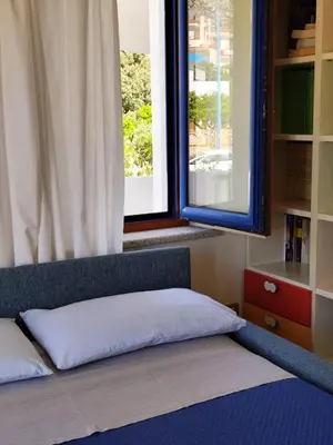 Letto o letti in una camera di B&B Easy Wind