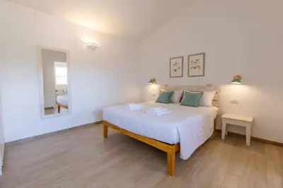 Letto o letti in una camera di B&B Natura