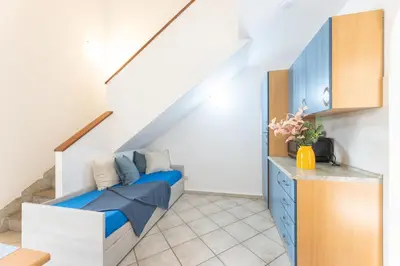 Cucina o angolo cottura di ISA-Apartments with air conditioning and external outdoor space in Budoni, at only 300 m from the beach