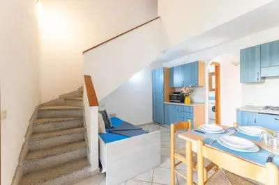 Cucina o angolo cottura di ISA-Apartments with air conditioning and external outdoor space in Budoni, at only 300 m from the beach