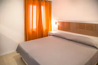 Letto o letti in una camera di Appartamenti Jlune