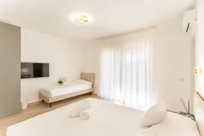 Letto o letti in una camera di Coclea Garden
