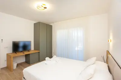Letto o letti in una camera di Coclea Garden