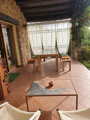 Area soggiorno di Villetta in Residence La Bouganville