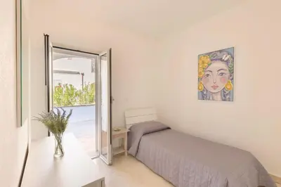 Letto o letti in una camera di ISA-Appartaments in Orosei with air conditioning