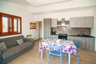 Cucina o angolo cottura di Residence Tanaunella