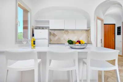 Cucina o angolo cottura di Appartamento Glory - Golfo Aranci, Baia Caddinas