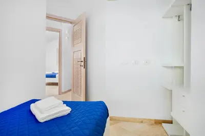 Letto o letti in una camera di Appartamento Glory - Golfo Aranci, Baia Caddinas