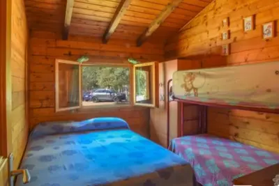 Letto o letti in una camera di Casa vacanze Berchida