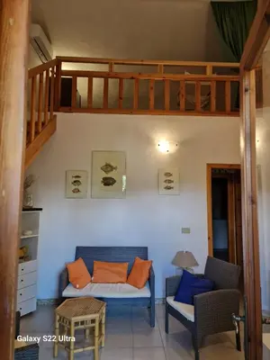 Area soggiorno di San Teodoro Appartamento Vacanze Centro