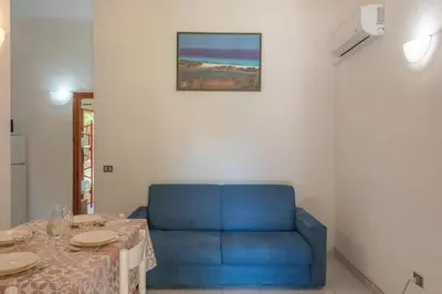 Area soggiorno di Outstanding Residenze Gallura 2 Bedroom sleeps plus Child