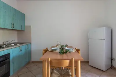 Cucina o angolo cottura di Simple Gem of Le Dimore di Budoni num1694