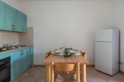 Cucina o angolo cottura di Simple Gem of Le Dimore di Budoni num1694